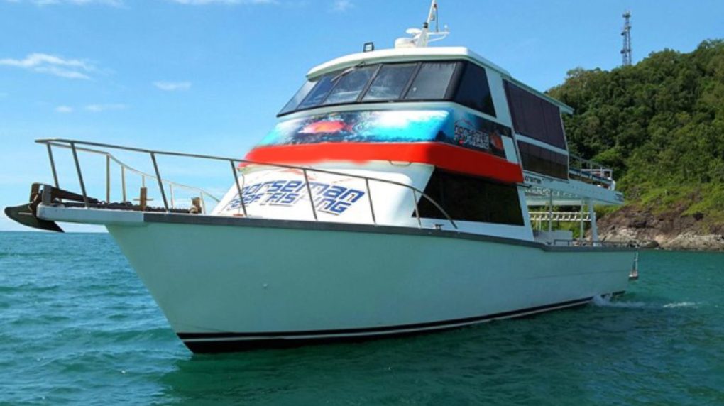5-norseman-port-douglas-fishing-charter-1024×768 a small boat in a body of water